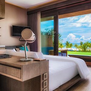 Pool Suite mit Kingsize-Bett und mit Strandblick